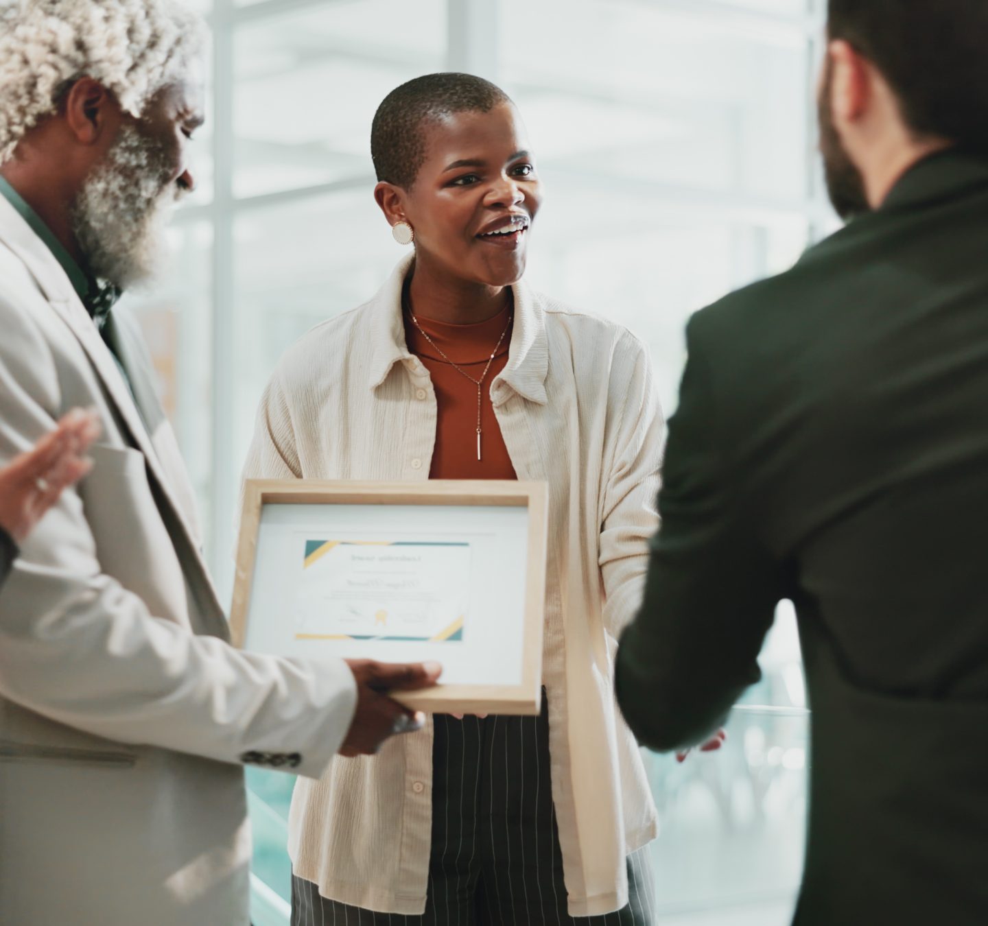 Business people, applause and celebration in office for certificate, achievement and development. T.
