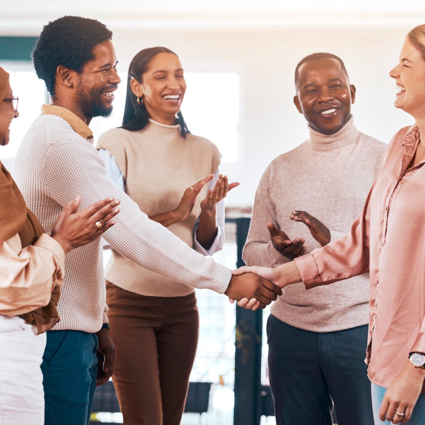Business people, clapping and diversity handshake in meeting celebration, success promotion or part.