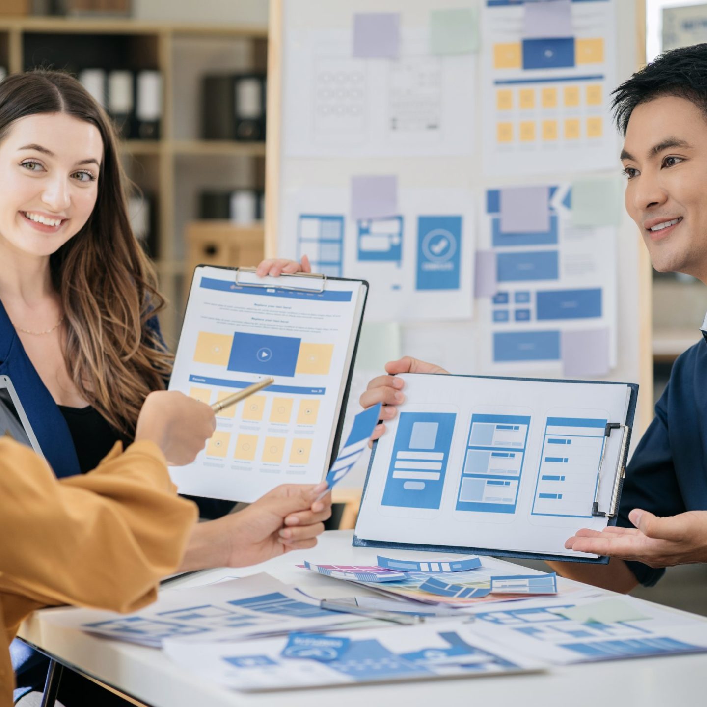 designer team shake hands confidently professional investor working with new startup project at an office meeting.